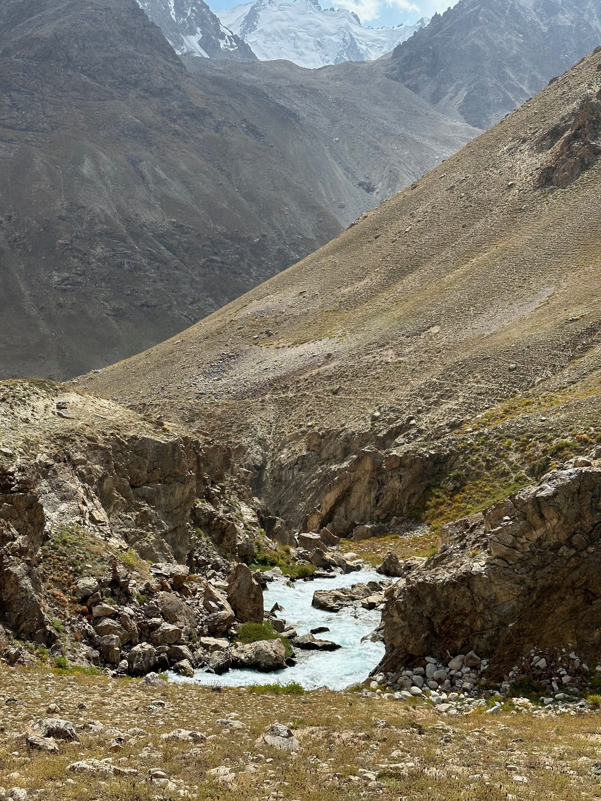 IMG_0346 A river winding through a rocky mountain valley